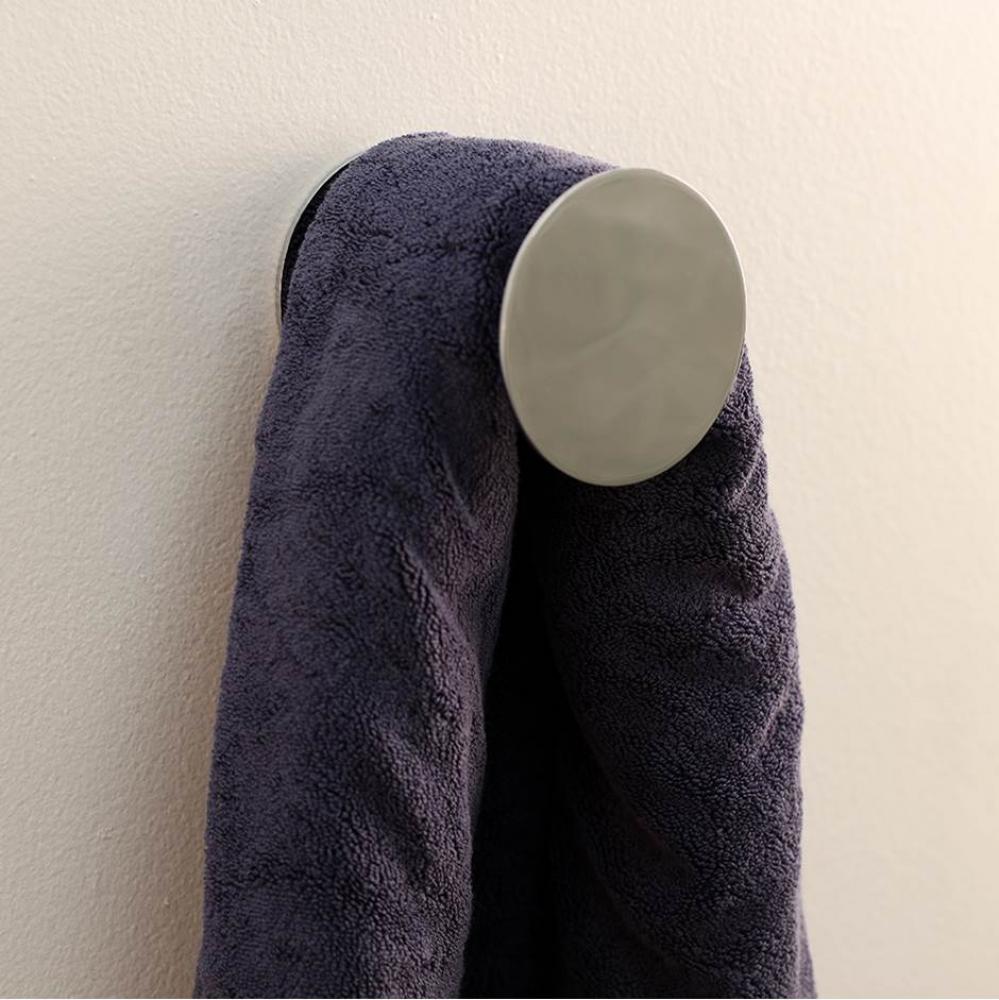 Wall-mount towel hook made of chrome plated brass. Diam: 4'', D: 3 1/4''.