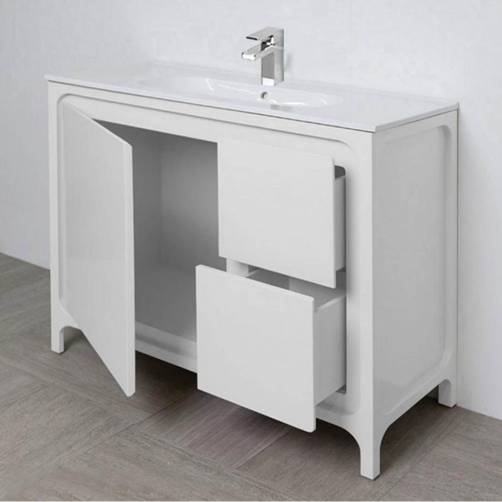 Free standing under counter vanity with routed finger pulls on two drawers and one door. Bathroom